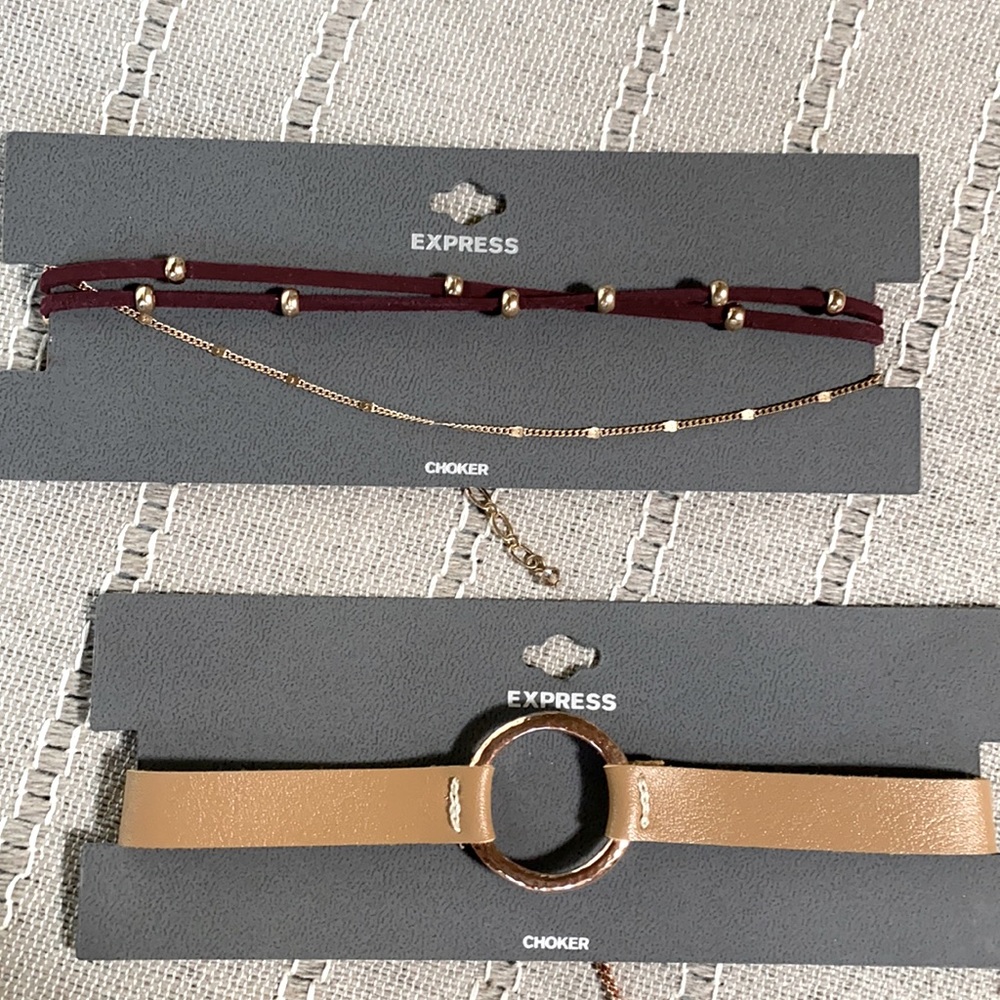 (2) Express brand chokers.
